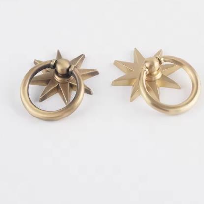 Anijsster-vormige kastgrepen a - Drawer Pull Gold recensie en prijs